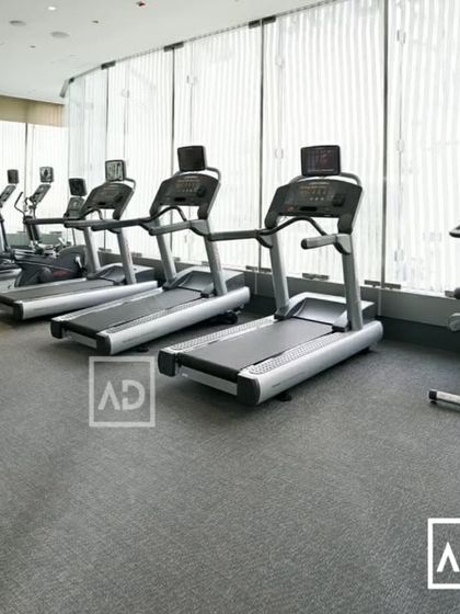 This is a commercial gym with my durable, low-pile carpet flooring. It's tough enough to handle heavy equipment and foot traffic while reducing noise.
