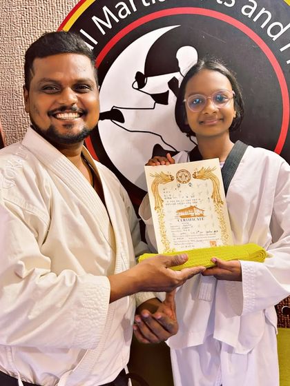 National Martial Arts and Fitness Academy - Kids Martial Arts & Fitness The Journey of Discipline: Belt Graduations photo 6