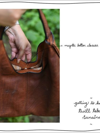 The magnetic button closure of the large Sunaina hobo bag, ensuring the open-mouth design stays neatly closed.