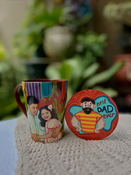 A Father's Day gift set, including a custom portrait mug and a 'Best Dad Ever' coaster.