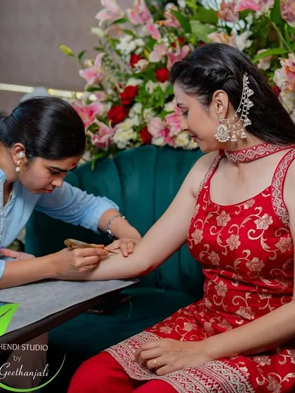 Here I am, completely in my element, focused on bringing a bride's vision to life. This is a behind the scenes look at the care and precision that goes into every single line of my bridal mehendi application.
