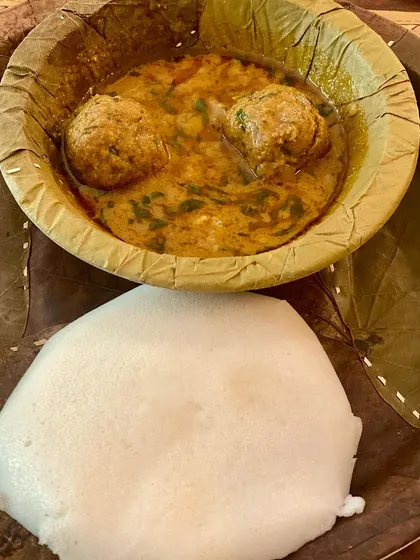 The classic combination of Khaima Unde Saaru and Ragi Mudde, a wholesome and traditional meal.