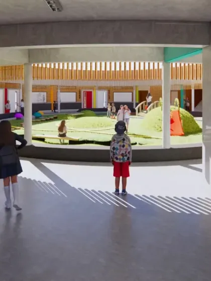 Looking out from the corridor into the central courtyard. The design prioritizes open, visible spaces that encourage interaction and a sense of community among students.