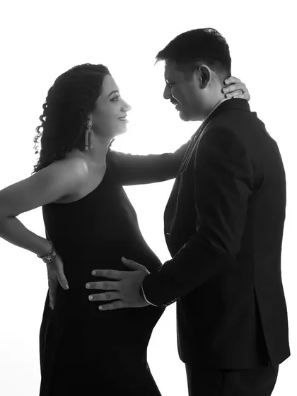 A duplicate of the modern couple's silhouette, highlighting their interaction and connection.