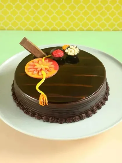 We love adding a sweet touch to your festivals. This Raksha Bandhan special features a rich chocolate glaze and an edible rakhi, making it the perfect treat to share with your sibling.