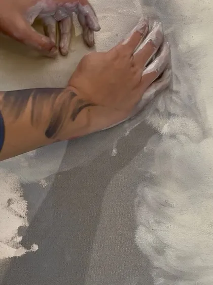 My hands, covered in paint, becoming part of the artwork itself. The process is messy and raw, just like the emotions I pour into each piece.