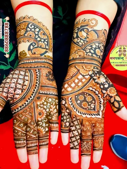 A stunning design featuring peacocks and intricate floral patterns. The combination of bold motifs and delicate fills gives this design a rich and textured appearance.