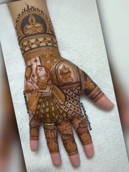 A unique Karwa Chauth design focusing on the woman getting ready. It shows a lady with a mirror and diya, surrounded by festive patterns.