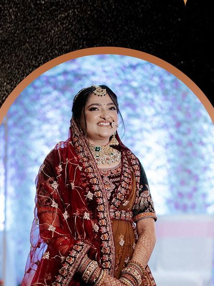 A beautiful portrait of the bride, her happiness radiating as she gets ready for her big day.