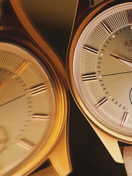An extreme close-up showing two Argos watches side-by-side. This macro shot highlights the subtle differences in the dial finishes and the precision of the hands and markers, demonstrating an eye for the finest details.