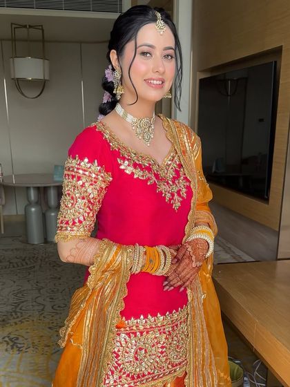 Shweta looks radiant and happy in her Haldi attire. The makeup is minimal and fresh, perfect for the occasion.