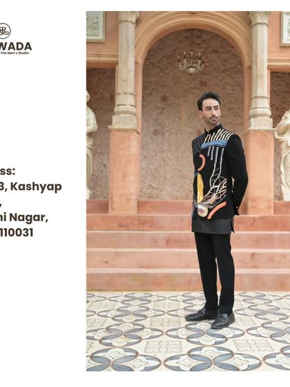 A full-length view of the abstract art bandhgala, set against a classic architectural backdrop, showing its versatility.