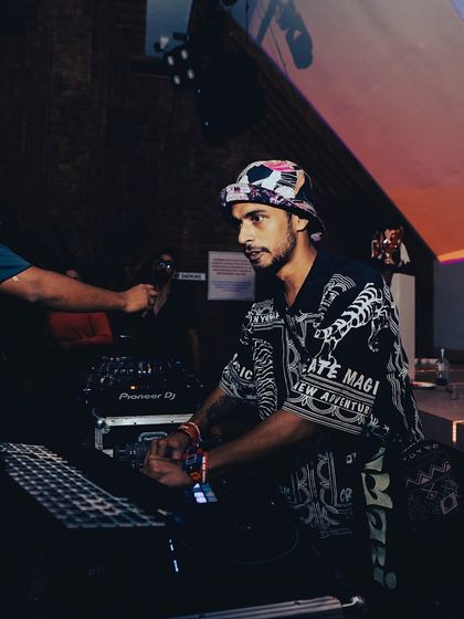 Another angle of me spinning at the 'Get Salty' party. The lighting and projections created a really cool, immersive atmosphere.