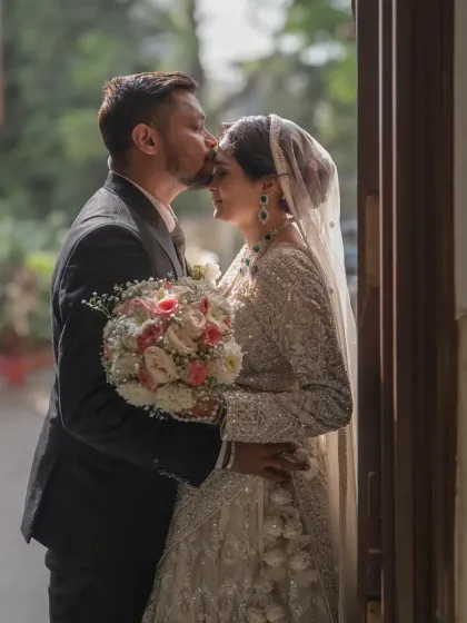 A tender forehead kiss is so simple yet so powerful. It’s a quiet promise. My goal is to capture these intimate gestures that tell the story of your love, like in this beautiful moment from a Mumbai wedding.
