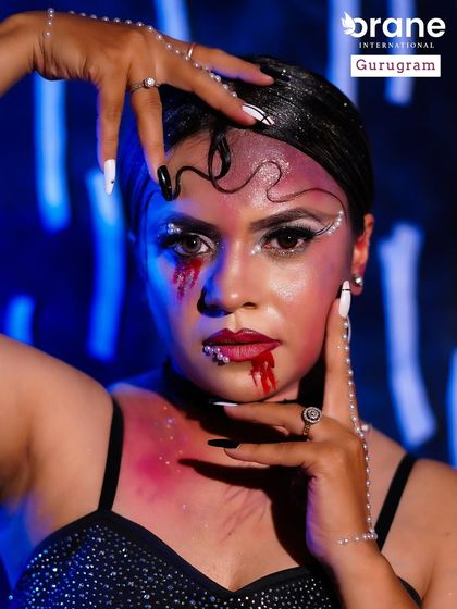 This "evil glam" look is a fantastic example of character makeup. Students learn to use makeup to create a narrative, combining beauty with darker, more dramatic elements.