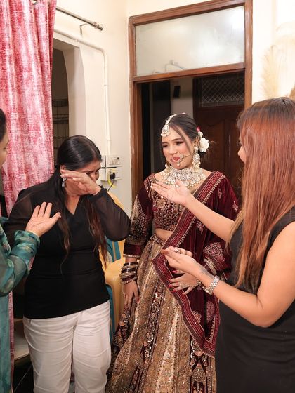 A candid moment from portfolio day, where I guide my students and we share some emotional moments.