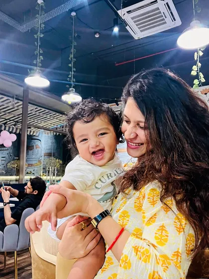 This is what it's all about: a happy mom and her laughing baby enjoying a carefree moment in our cafe. We love seeing our guests become a part of the Angels n Brats family.