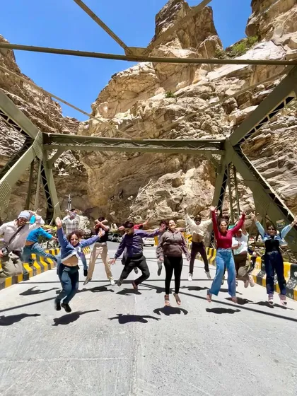 Pure joy and energy from the group jumping on a bridge in Spiti. This is the kind of spontaneous fun that happens when you're on the road with like-minded adventurers.
