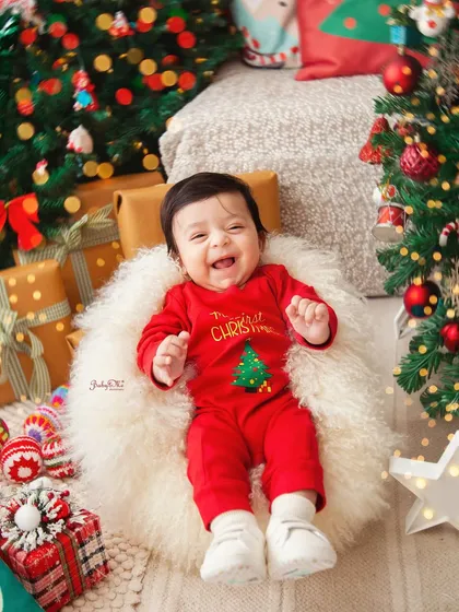 A huge, beaming smile that truly captures the spirit of Christmas. These sessions are filled with so much joy and laughter.