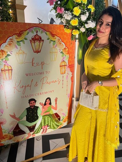 Another happy moment seeing my designs at a real wedding. This vibrant Haldi ceremony welcome board features a fun caricature of the couple and a bright orange theme with lantern illustrations.