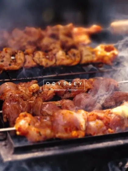 The irresistible sizzle of our live barbecue station. We use high-quality ingredients to grill skewers to perfection, creating a smoky, flavorful, and interactive dining element that guests absolutely love at outdoor events and community gatherings.