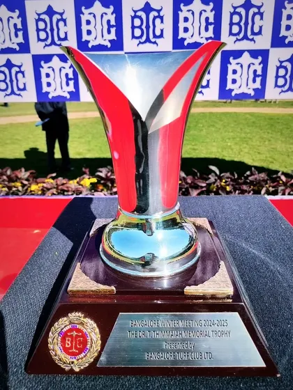 The Dr. T. Thimmaiah Memorial Trophy, a sleek and modern design.