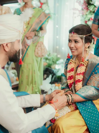 A sweet moment between the couple during their wedding ceremony.