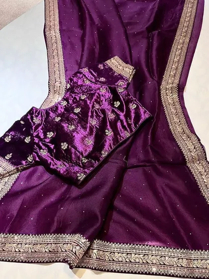 A look at my Sabyasachi-inspired collection. These sets feature pure organza sarees with detailed borders, paired with luxurious velvet designer blouses. They are available in a range of beautiful colors like brown, navy, green, black, yellow, purple, and off-white.