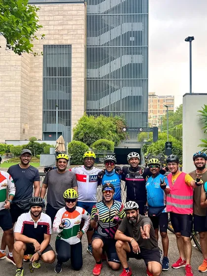 The whole crew posing after a weekend ride. The variety of jerseys and bikes shows the unique personality of each member in our cycling family.