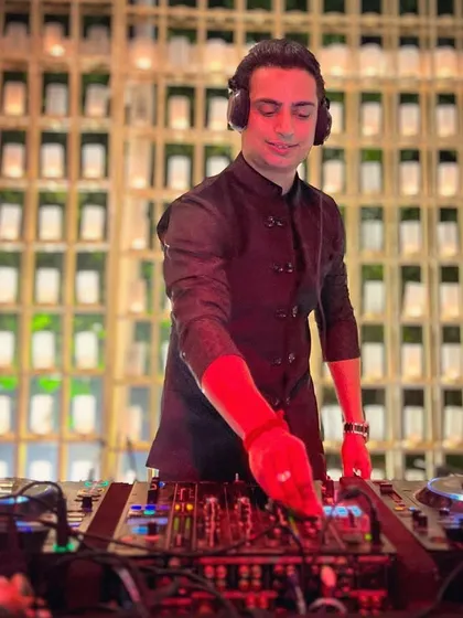 Another shot from the Sufi night, with the red light catching my hand on the mixer. The details matter in creating the right atmosphere.