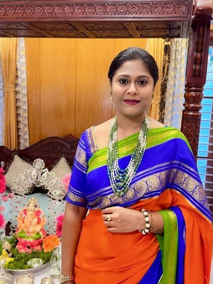 A festive look from a client, looking beautiful in her Dhavala saree during Ganesh Chaturthi celebrations.