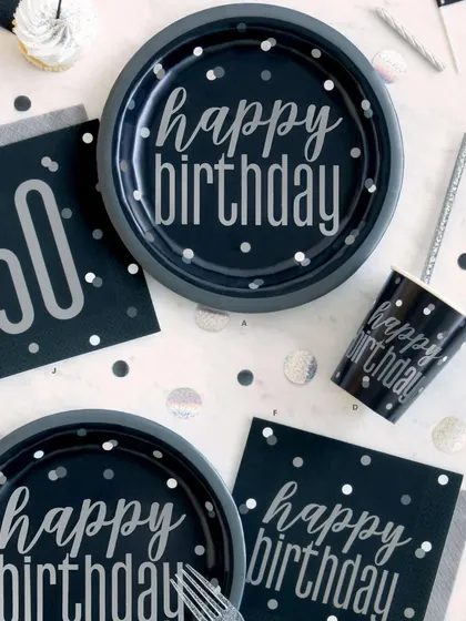 Get ready to party with this chic black and silver 'Happy Birthday' tableware set, perfect for a stylish milestone celebration.