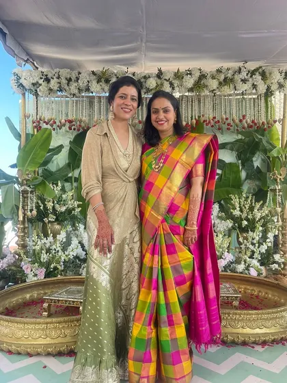 A beautiful shot with the bride at a South Indian lunch. I styled my own fusion look with a Zara top and a dress worn as a skirt, while she looks radiant in a traditional silk saree.