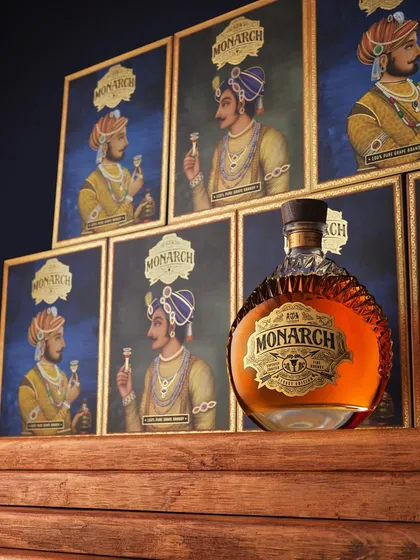 Stepping up the game. For the Monarch launch, we created this tiered display using the brand's packaging, with the bottle proudly at the center. It creates a sense of grandeur and highlights the beautiful artwork.