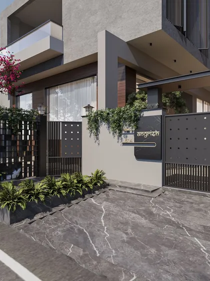 Our work begins at the threshold. The entrance to this modern villa balances clean architectural lines with organic textures like stone and wood, while lush greenery and a striking gate design create a welcoming first impression that is both grand and grounded.