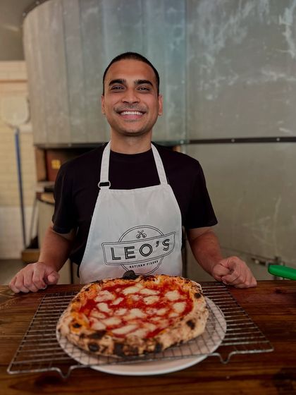 A smile and a fresh pizza. This is what it's all about for me. Sharing my love for Neapolitan pizza with you.