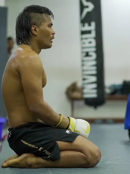 A moment of rest between rounds for one of our pro fighters. The physical and mental toll of a fight camp is immense, but it's what's required to be a champion.