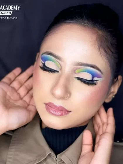 The closed-eye shot allows a full appreciation of the multi-color eyeshadow blend. Our trainers guide students on how to create seamless gradients with multiple shades.