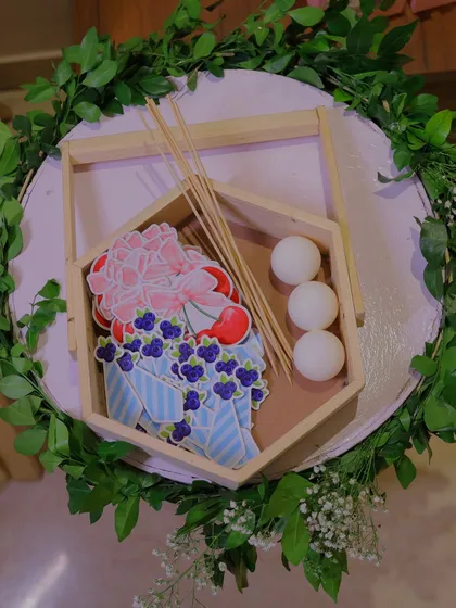 A collection of materials for a baby shower activity or party favor. The custom-printed cards and natural elements are ready to be assembled into a memorable keepsake.