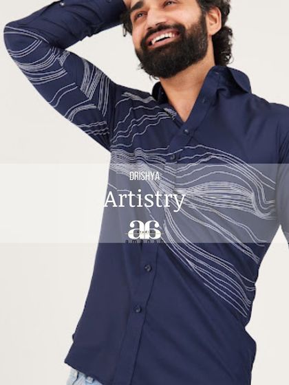 A joyful, expressive shot that captures the shirt in motion. The "Artistry" text overlay reinforces the creative spirit of the design.