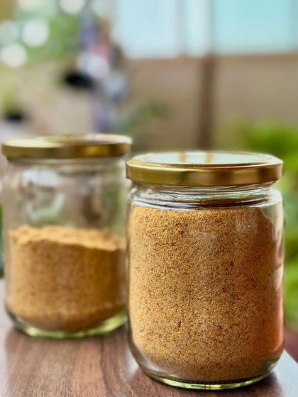 A closer look at the two jars of my homemade flaxseed pudi. It's a perfect example of how traditional Indian recipes can be incredibly healthy.