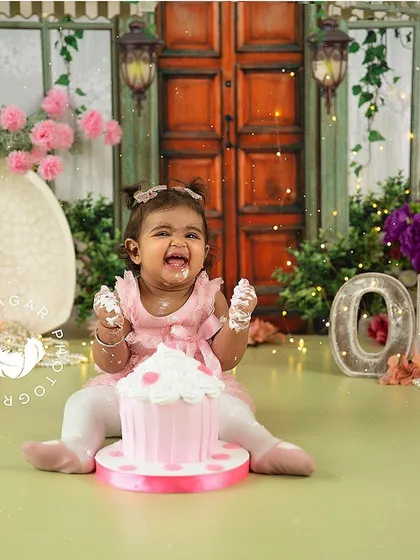 The pure, unfiltered joy of a first birthday cake smash. I love creating these vibrant, personalized setups and then just letting the little ones have the best time, resulting in genuine smiles and laughter.