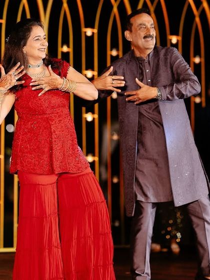 The parents of the bride showing off their moves. We love seeing the joy on their faces as they perform for their daughter.