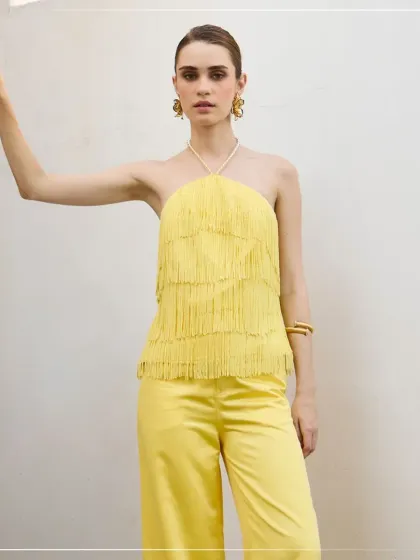 A full-length shot highlighting how our makeup complements the entire fashion statement. The look is polished and striking, designed to make an impact from head to toe.