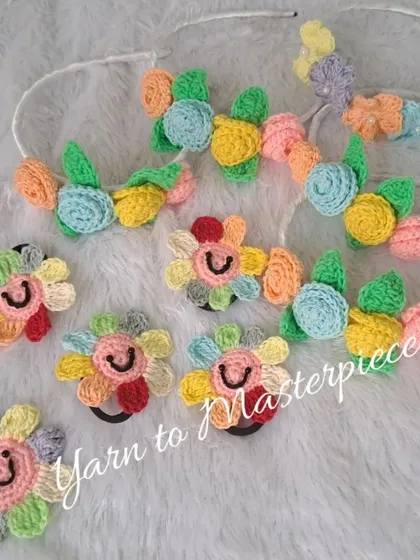 A whole collection of my rainbow-themed hair accessories. This includes floral headbands and smiling flower hair ties, perfect for return gifts or party packs.