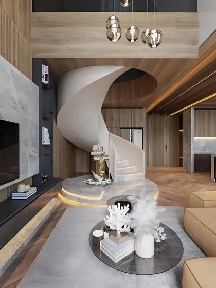 We specialize in creating grand, impactful living spaces. This duplex living room features a stunning spiral staircase as a central sculptural element, complemented by a marble-clad media wall and sophisticated lighting.