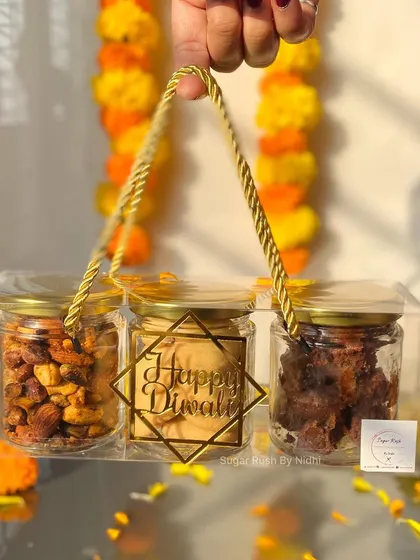 My popular 3-jar Diwali hamper. This one has a perfect mix of sweet and savory with Peri Peri Nuts, Butter Cookies, and fudgy Brownie Bites.
