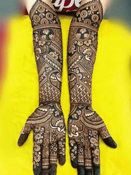 A beautiful and intricate design with a mix of floral and paisley patterns.