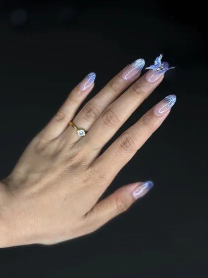 We encourage our students to push their creative boundaries. This intricate 4D butterfly nail art is a perfect example of the advanced, trend-setting skills you can master in our nail craft course.