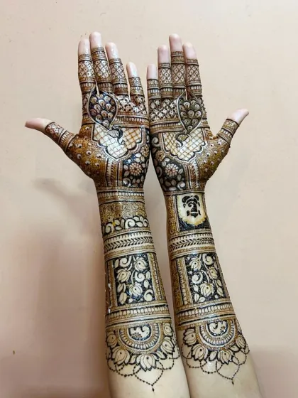 Another view of this stunning full-coverage bridal mehndi, showing the design from the back of the hands.